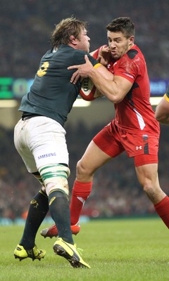 291114 - Wales v South Africa, Dove Men Series 2014, Cardiff - Rhys Webb of Wales tackles Duane Vermeulen of South Africa 