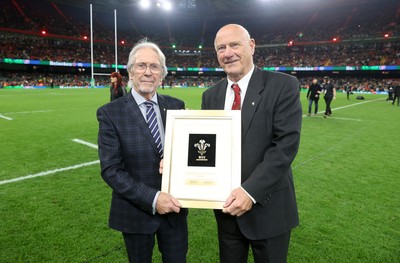 291125 - Wales v South Africa Springboks - Quilter Nations Series - Stadium Announcer Iestyn Garlick is presented a plaque by WRU president Terry Butcher as he retires after 35 years