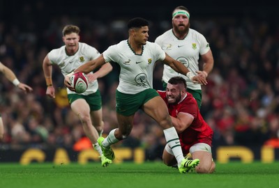 291125 - Wales v South Africa Springboks, Quilter Nations Series - Sacha Feinberg-Mngomezulu of South Africa is tackled by Gareth Thomas of Wales