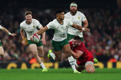 291125 - Wales v South Africa Springboks, Quilter Nations Series - Sacha Feinberg-Mngomezulu of South Africa is tackled by Gareth Thomas of Wales