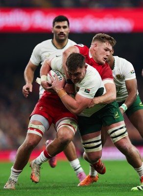 291125 - Wales v South Africa Springboks, Quilter Nations Series - Jasper Wiese of South Africa is held by Taine Plumtree of Wales