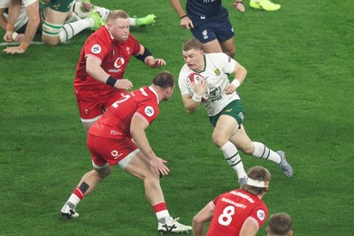 291125 - Wales v South Africa - Quilter Nations Series - Morne van den Berg of South Africa runs at Dewi Lake and Keiron Assiratti of Wales