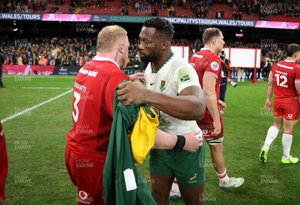 291125 - Wales v South Africa Springboks - Quilter Nations Series - Keiron Assiratti of Wales and Siya Kolisi of South Africa at full time