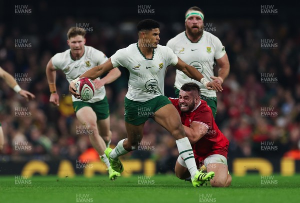291125 - Wales v South Africa Springboks, Quilter Nations Series - Sacha Feinberg-Mngomezulu of South Africa is tackled by Gareth Thomas of Wales