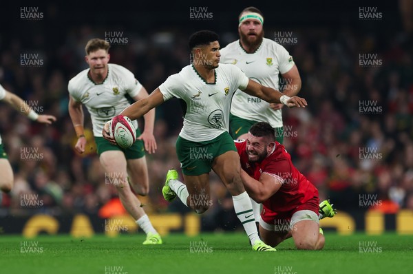 291125 - Wales v South Africa Springboks, Quilter Nations Series - Sacha Feinberg-Mngomezulu of South Africa is tackled by Gareth Thomas of Wales