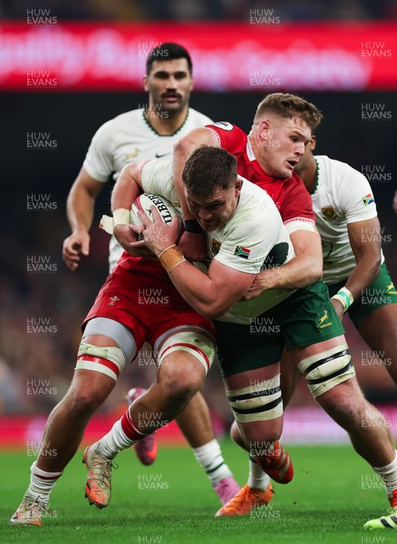 291125 - Wales v South Africa Springboks, Quilter Nations Series - Jasper Wiese of South Africa is held by Taine Plumtree of Wales