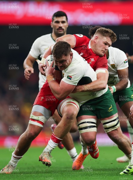 291125 - Wales v South Africa Springboks, Quilter Nations Series - Jasper Wiese of South Africa is held by Taine Plumtree of Wales