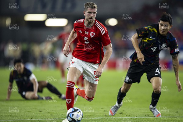 070923 - Wales v South Korea - International Friendly - Chris Mepham of Wales in action against Minjae Kim of South Korea