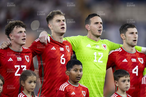 070923 - Wales v South Korea - International Friendly - Nathan Broadhead, Joe Rodon, Wales goalkeeper Danny Ward & Ben Davies of Wales during the national anthem