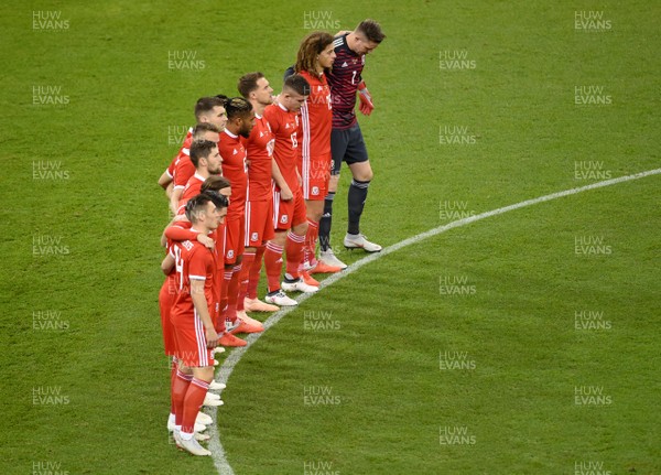 111018 - Wales v Spain - International Friendly Football - Wales players line up fora minute silence