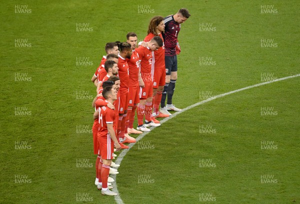 111018 - Wales v Spain - International Friendly Football - Wales players line up fora minute silence