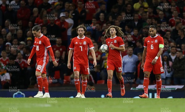 111018 - Wales v Spain - International Friendly - Dejected Harry Wilson, Joe Allen, Ethan Ampadu and Ashley Williams of Wales