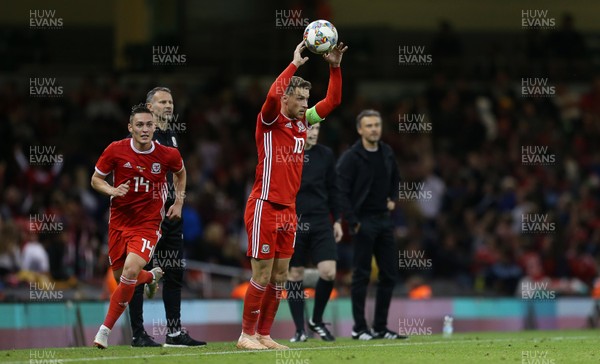 111018 - Wales v Spain - International Friendly - Aaron Ramsey of Wales takes a throw in