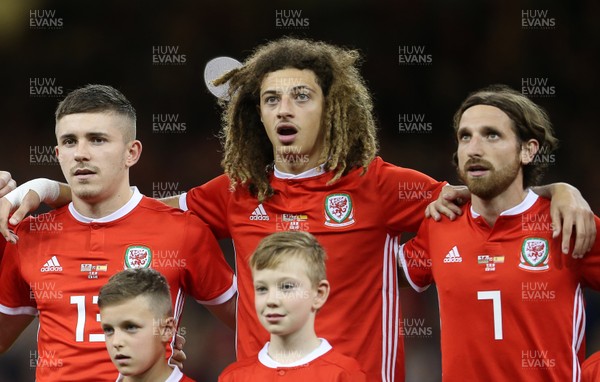 111018 - Wales v Spain - International Friendly - Declan John, Ethan Ampadu and Joe Allen of Wales