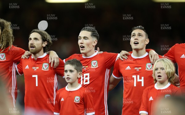 111018 - Wales v Spain - International Friendly - Joe Allen, Harry Wilson and Connor Roberts of Wales