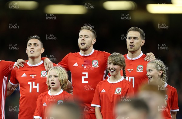 111018 - Wales v Spain - International Friendly - Connor Roberts, Chris Gunter and Aaron Ramsey of Wales