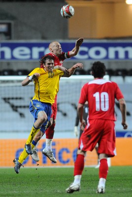 03.03.10 - International Football Friendly, Wales v Sweden Sweden's Johan Johan Elmander and Wales' James Collins compete 