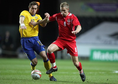 03.03.10 ... Wales v Sweden, Friendly International, Swansea -  Wales' Jack Collison gets away from Sweden's Johan Elmander  