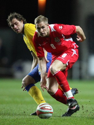 03.03.10 ... Wales v Sweden, Friendly International, Swansea -  Wales' Jack Collison gets away from Sweden's Johan Elmander  