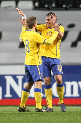 03.03.10 ... Wales v Sweden, Friendly International, Swansea -  Sweden's Johan Elmander celebrates with Anders Svensson  after scoring goal 