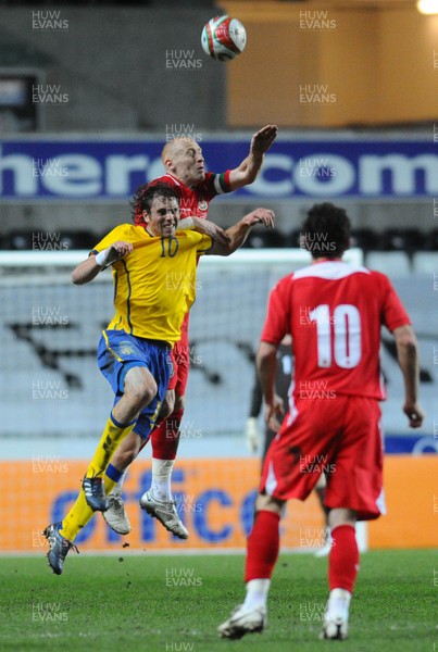 03.03.10 - International Football Friendly, Wales v Sweden Sweden's Johan Johan Elmander and Wales' James Collins compete 