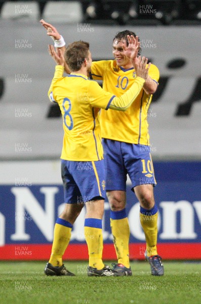03.03.10 ... Wales v Sweden, Friendly International, Swansea -  Sweden's Johan Elmander celebrates with Anders Svensson  after scoring goal 