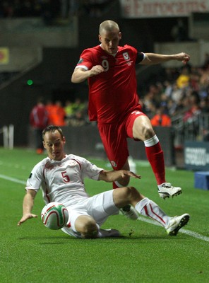 07.10.11 -  Wales v Switzerland, Euro 2012 Qualifying Match -  Wales' Steve Morrison  is brought down by Switzerland's Steve Von Bergen 