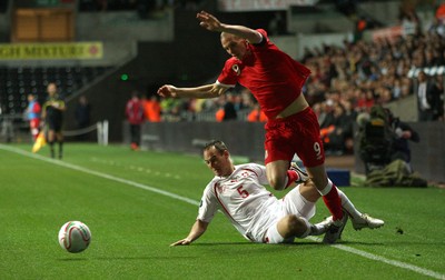 07.10.11 -  Wales v Switzerland, Euro 2012 Qualifying Match -  Wales' Steve Morrison  is brought down by Switzerland's Steve Von Bergen 