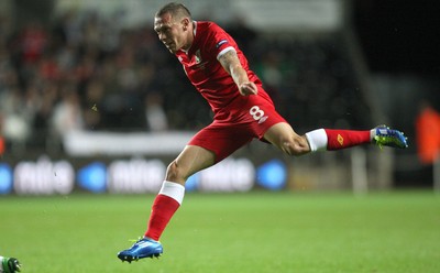 07.10.11 -  Wales v Switzerland, Euro 2012 Qualifying Match -  Wales' Craig Bellamy fires shot at goal 