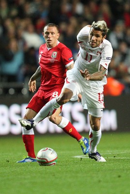 07.10.11 -  Wales v Switzerland, Euro 2012 Qualifying Match -  Switzerland's Valon Behrami is closed down by Wales' Craig Bellamy  