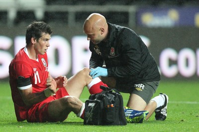 07.10.11 -  Wales v Switzerland, Euro 2012 Qualifying Match -  Wales' Gareth Bale goes down with injury  