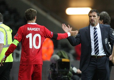 07.10.11 -  Wales v Switzerland, Euro 2012 Qualifying Match -  Wales' Aaron Ramsey is congratulated by manager gary Speed as he leaves the pitch  