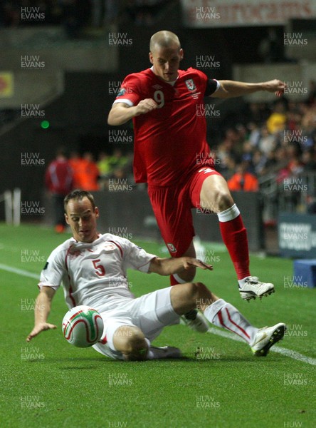 07.10.11 -  Wales v Switzerland, Euro 2012 Qualifying Match -  Wales' Steve Morrison  is brought down by Switzerland's Steve Von Bergen 