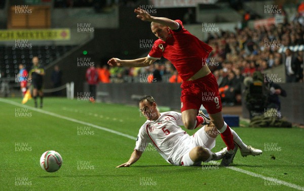 07.10.11 -  Wales v Switzerland, Euro 2012 Qualifying Match -  Wales' Steve Morrison  is brought down by Switzerland's Steve Von Bergen 