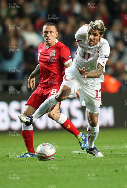 07.10.11 -  Wales v Switzerland, Euro 2012 Qualifying Match -  Switzerland's Valon Behrami is closed down by Wales' Craig Bellamy  