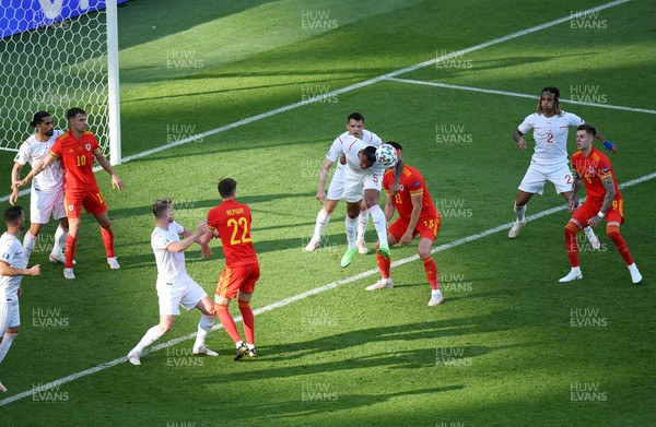 120621 - Wales v Switzerland, European Championship - Group A - Manuel Akanji of Switzerland gets the ball away