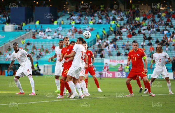 120621 - Wales v Switzerland, European Championship - Group A - Aaron Ramsey and Gareth Bale watch on as Kieffer Moore of Wales scores a goal