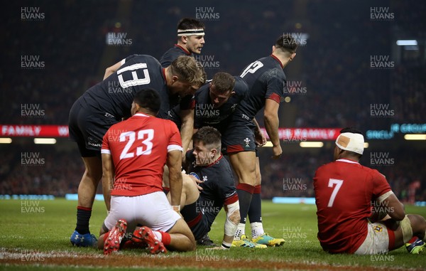 171118 - Wales v Tonga - Under Armour Series - Steff Evans of Wales celebrates scoring a try with team mates