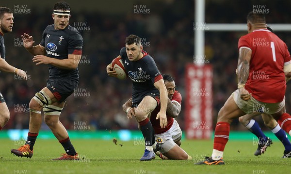 171118 - Wales v Tonga - Under Armour Series - Tomos Williams of Wales is tackled by Sonatane Takulua of Tonga