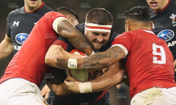 171118 - Wales v Tonga, Under Armour Series 2018 - Wyn Jones of Wales is held by the Tongan defence