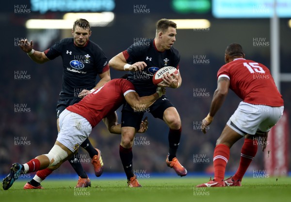 171118 - Wales v Tonga - Under Armour Series -  Liam Williams of Wales is tackled by Daniel Kilioni of Tonga