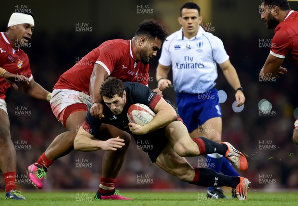 171118 - Wales v Tonga - Under Armour Series -  Jonah Holmes of Wales is tackled by Sione Vailanu of Tonga