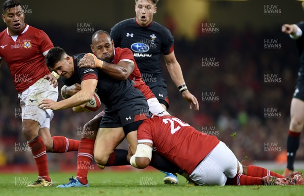 171118 - Wales v Tonga - Under Armour Series -  Owen Watkin of Wales is tackled by Vunga Lilo and Mike Faleafa of Tonga
