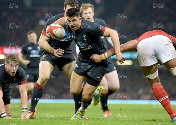171118 - Wales v Tonga - Under Armour Series -  Owen Watkin of Wales is tackled by Leva Fifita of Tonga