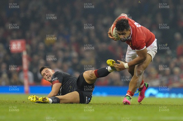 171118 - Wales v Tonga - Under Armour Series - Sione Vailanu of Tonga brushes aside Elliot Dee of Wales 