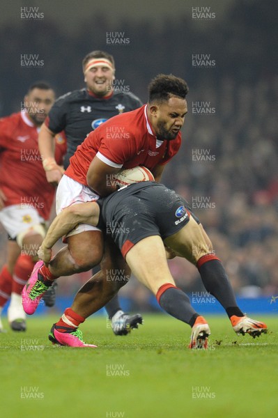 171118 - Wales v Tonga - Under Armour Series - Sione Vailanu of Tonga  is tackled by Jonah Holmes of Wales 