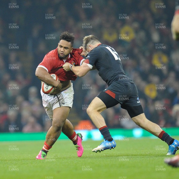 171118 - Wales v Tonga - Under Armour Series - Sione Vailanu of Tonga is tackled by Tyler Morgan of Wales 