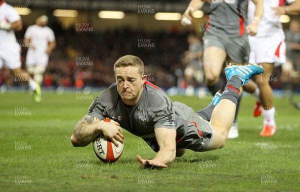 221113 - Wales v Tonga - Dove Men Series 2013 - Owen Williams of Wales scores the first try