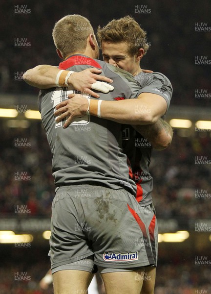 221113 - Wales v Tonga - Dove Men Series 2013 - Owen Williams of Wales celebrates scoring with Hallam Amos