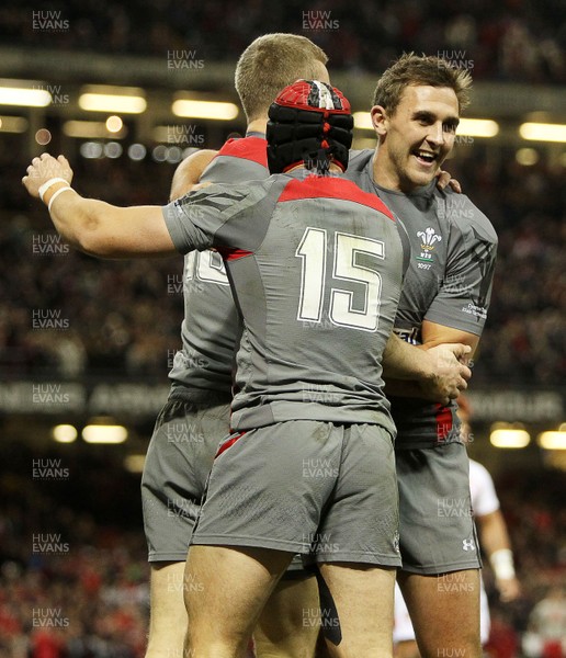 221113 - Wales v Tonga - Dove Men Series 2013 - Owen Williams of Wales celebrates scoring with Hallam Amos and Leigh Halfpenny